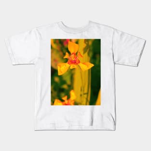 Yellow red lily blossom on yellow background Kids T-Shirt